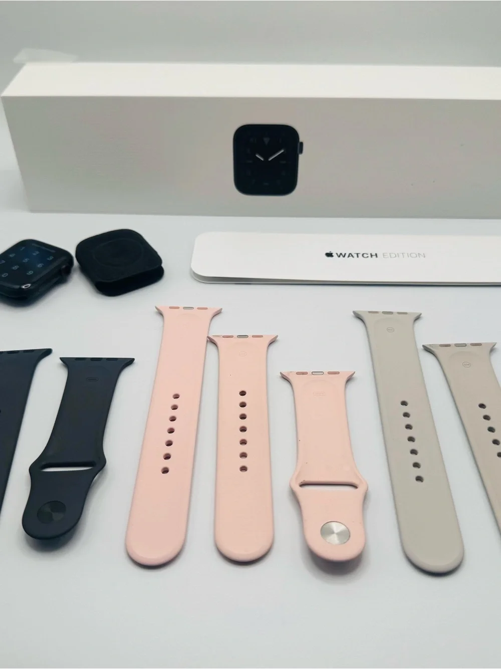 Apple Watch Series 5 44m w/ Apple Silicone Watch Bands — Pink, Gray, and Black